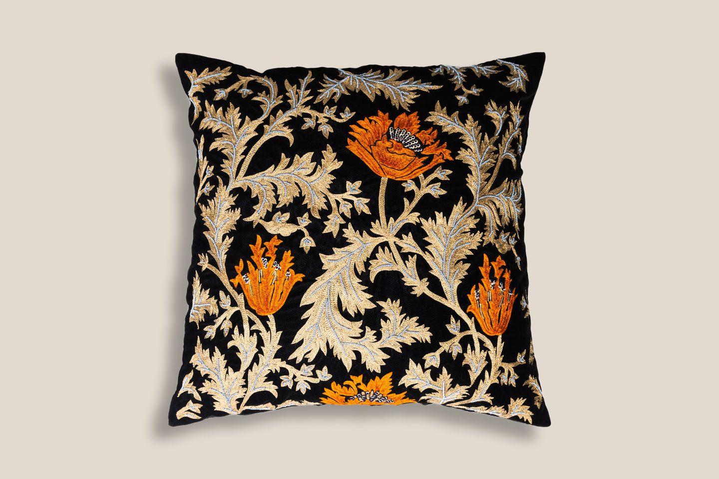 front of an exclusive orange tulips on black velvet fabric with intricate resham work & grey beads