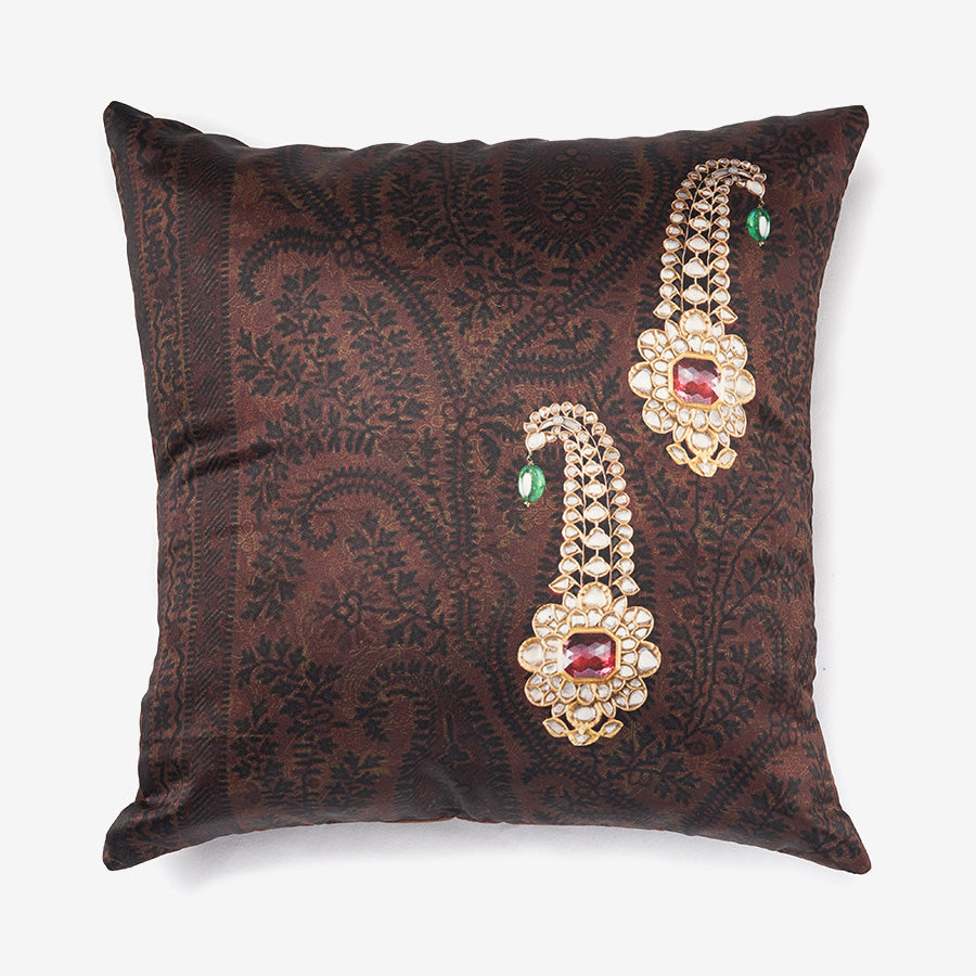 Front of a brown silk luxury cushion with heritage jewellery prints