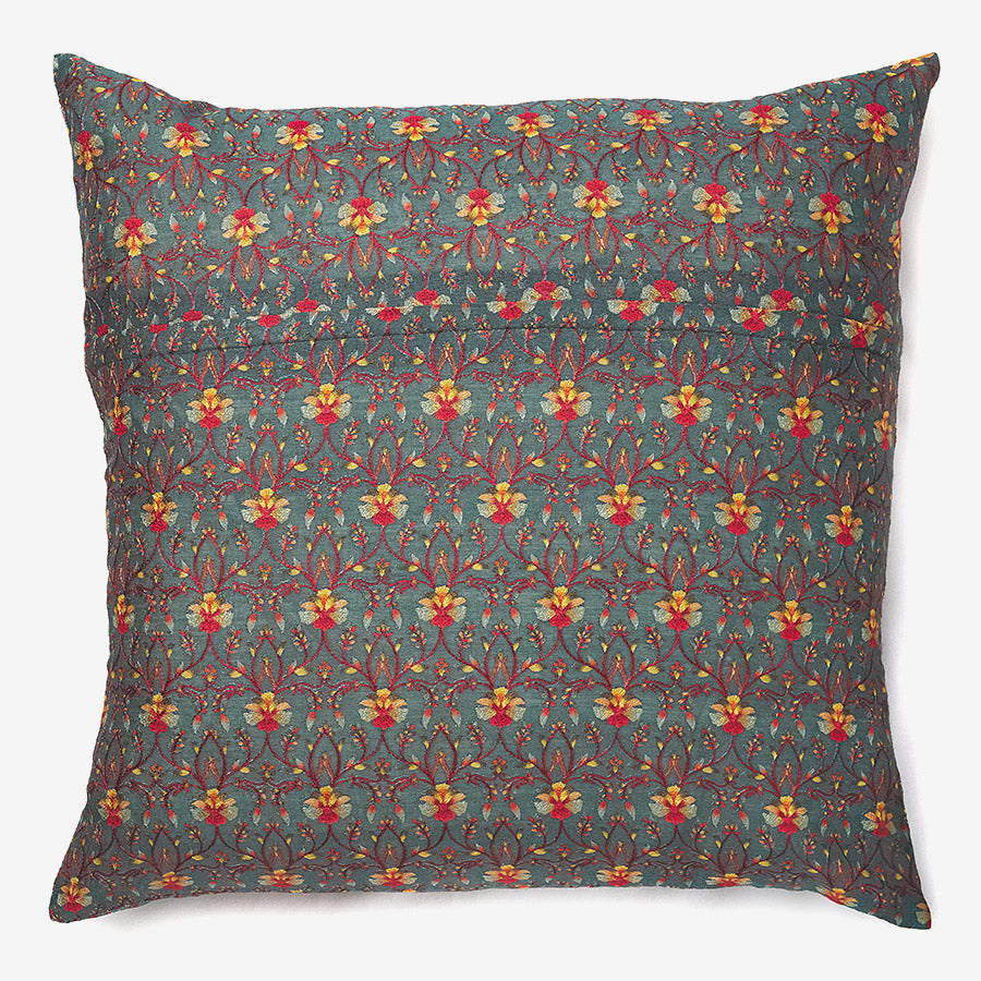 back of a Phooldani - green silk luxury cushion with orange flower thread work