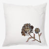 front of a white linen luxury cushion with sequin flowers