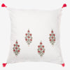 front of a White linen luxury cushion with zardozi work and tassels