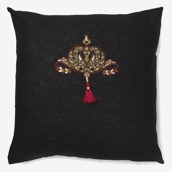 front of a Black linen luxury cushion with zardozi motifs, beads & tassel