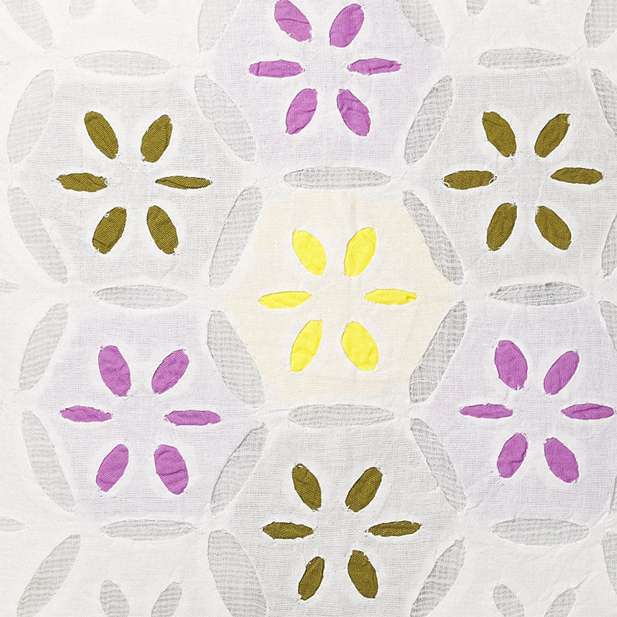 detail of a White luxury cushion cover with multicolour leaves