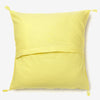 back of a yellow luxury cushion