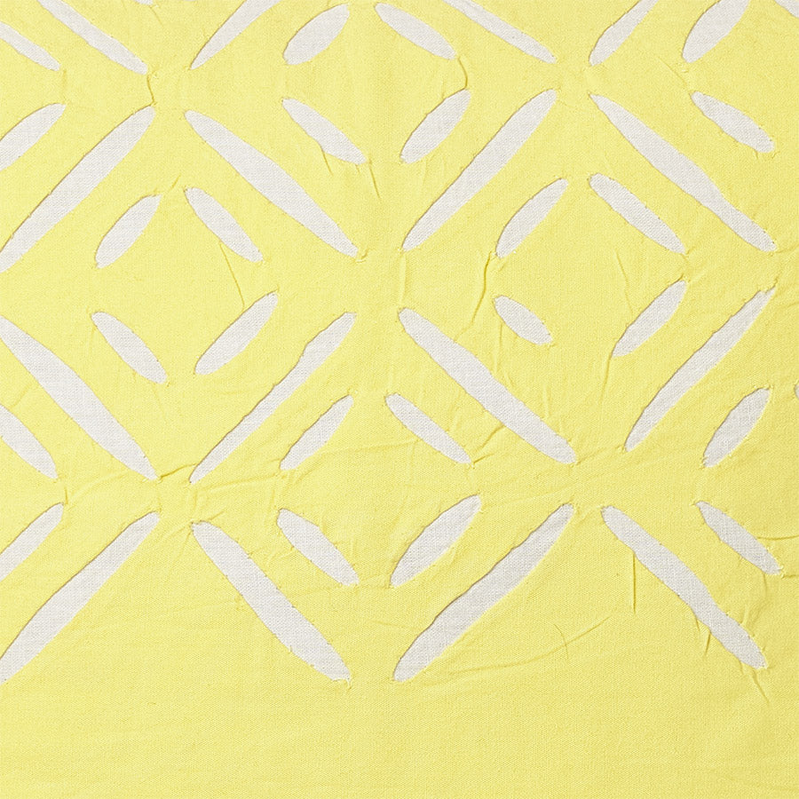 detail of a yellow luxury cushion cover