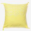 front of a yellow and white luxury cushion 